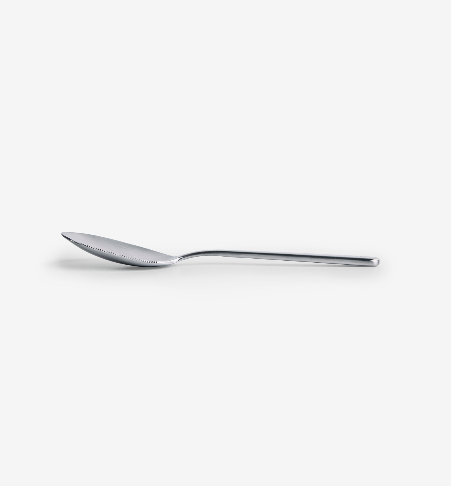 Stainless steel grapefruit spoon with serrated tip and long slim handle